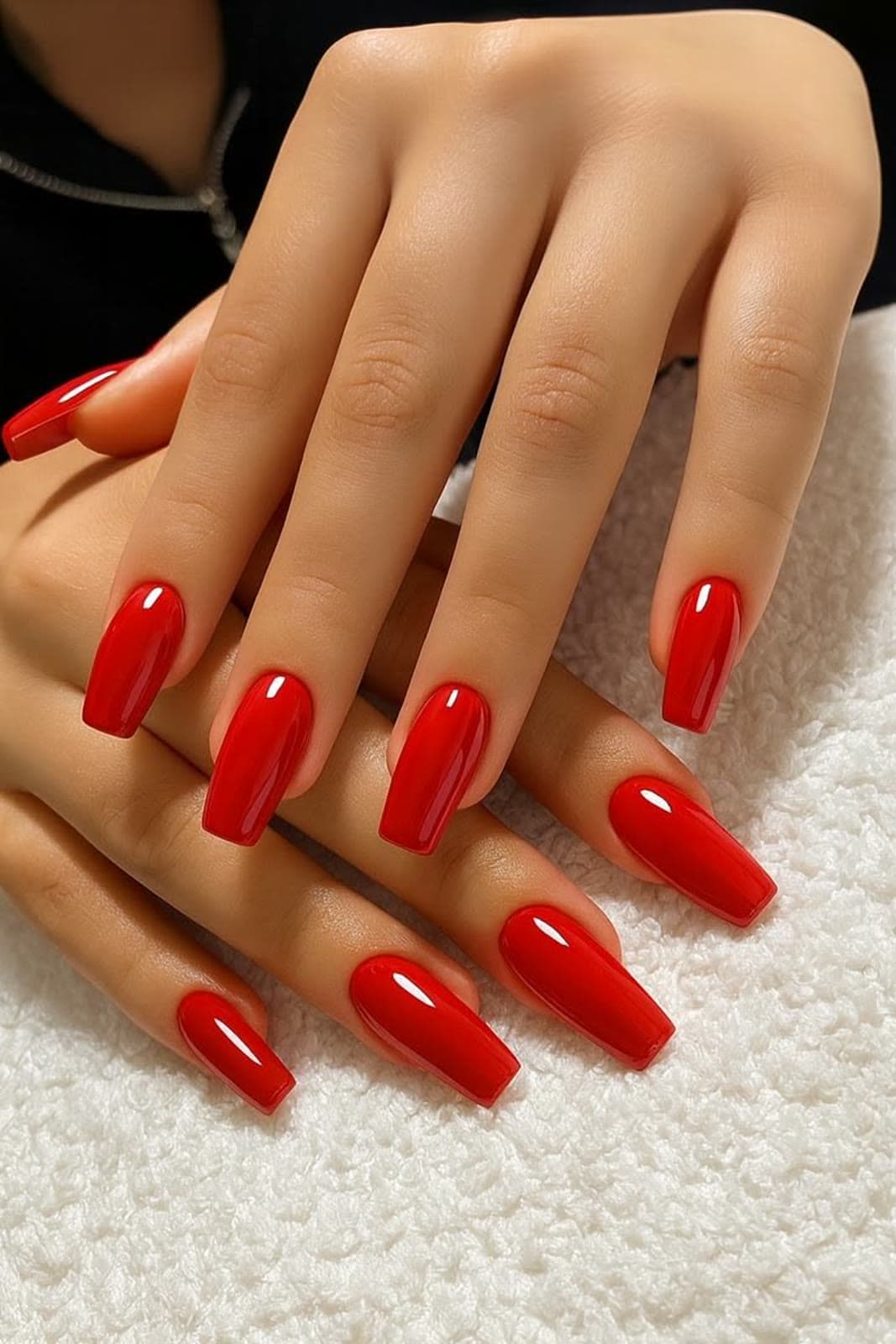 Red Glossy Coffin — Gel manicures, pedicures, nail art & extensions at Qasr Alshar Salon, Dubai — near Union Metro, Deira.